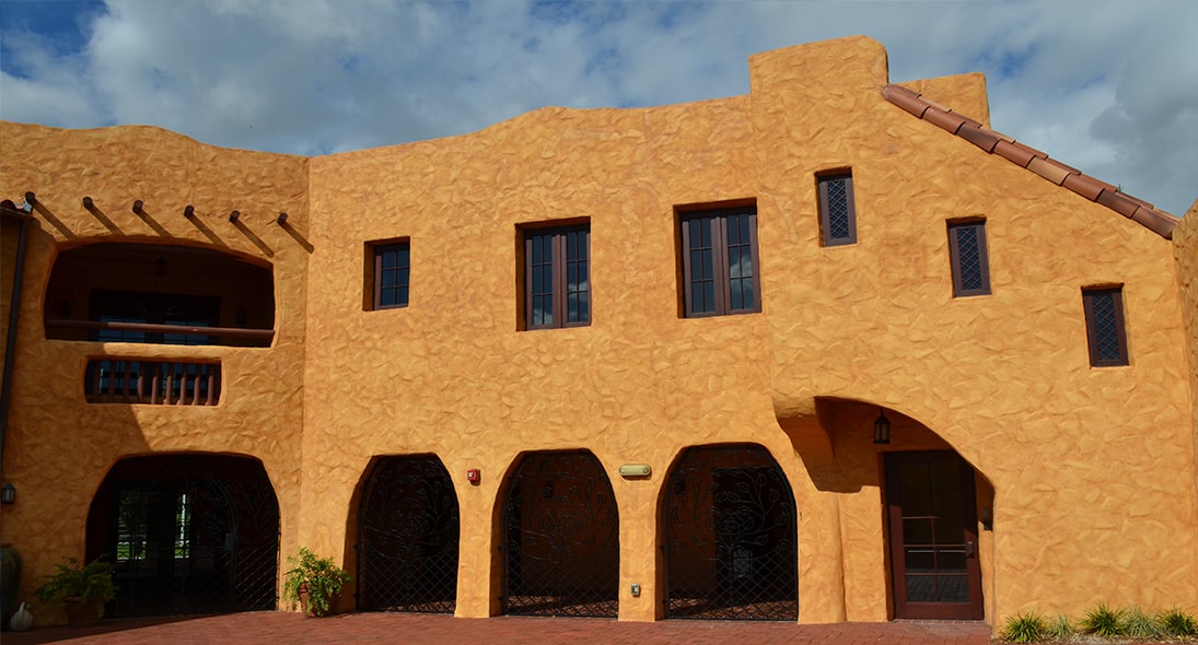 Historic building with restored mahogany windows and doors